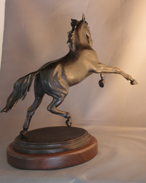 Horse sculpture in bronze of horse rearing